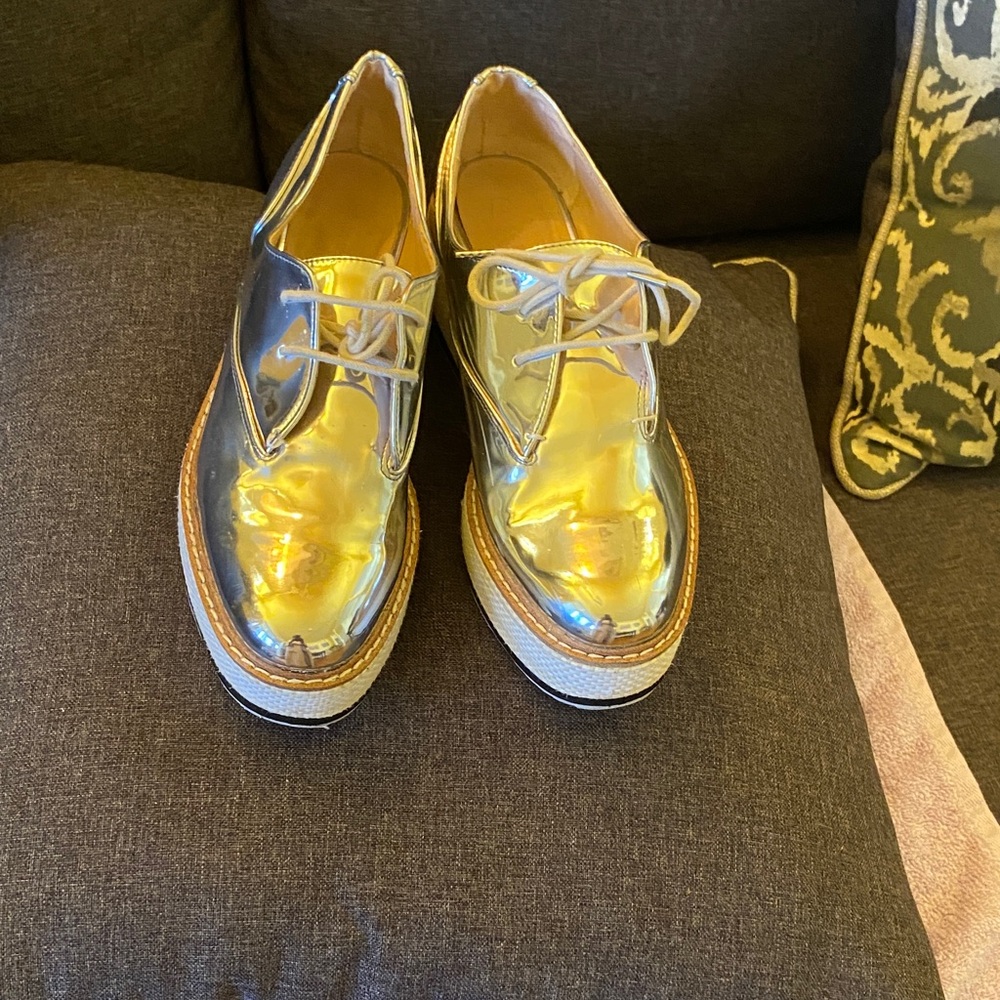 Women's shiny silver Oxford type shoes